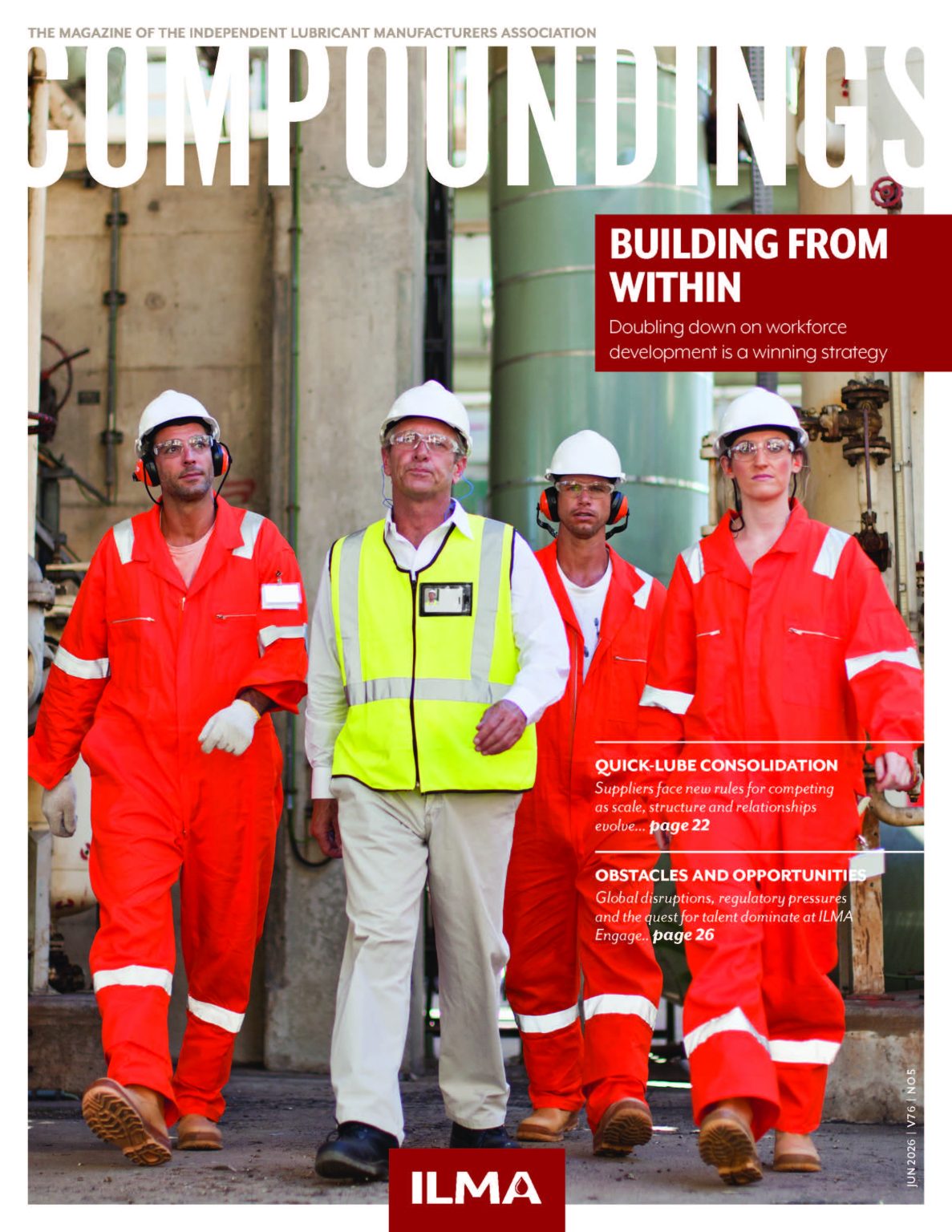 Group of four industrial workers in safety gear posing in a factory, on the cover of an ILMA magazine with a red headline block.